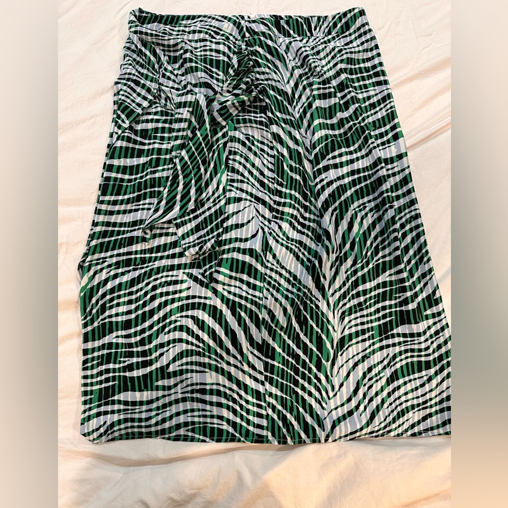 Beach skirt zippers up in back I never wore it